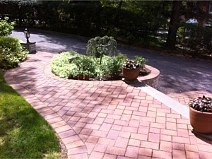 crab orchard nicolock walkway steps with planter in middle melville brick paver pavers